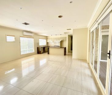 Spacious 4-Bedroom Family Home with Study in Prime Caroline Springs Location - Photo 1