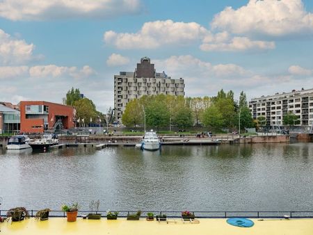 Prachtig gerenoveerd appartement met groot dakterras en uniek Zicht op de Leie en Portus Ganda - Photo 4