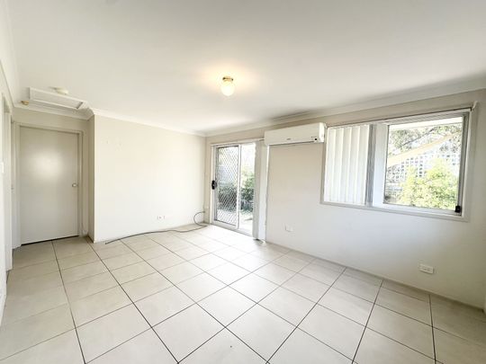 Modern Comfort in a Quiet Airds Locale - Photo 1