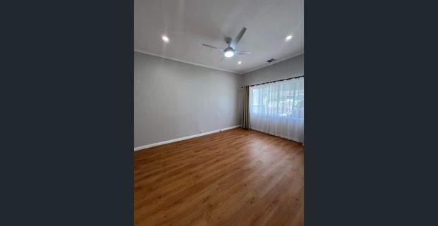 Luxuriously renovated home with landscaped gardens & security system - Photo 1