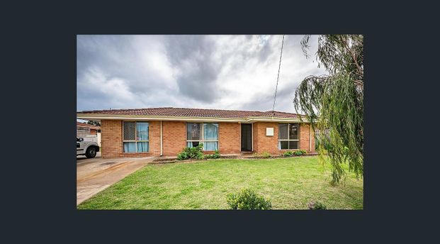 Family Home With A Shed - Photo 1