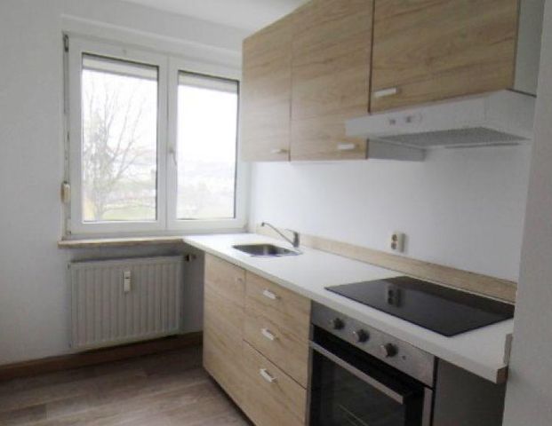 Zweckmäßige 3-Zimmer-Wohnung mit Einbauküche - Foto 1