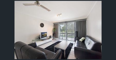 FIRST FLOOR UNIT WITH GOLF COURSE VIEWS & FANTASTIC BREEZES! - Photo 2