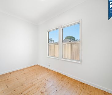 Charming Three-Bedroom Home with Freshly Landscaped Gardens - Photo 6