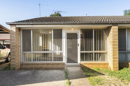 Tidy Two-Bedroom Unit in the Heart of Town - Photo 5