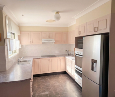 Spacious Family Home in a Prime Glenmore Park Location - Photo 2