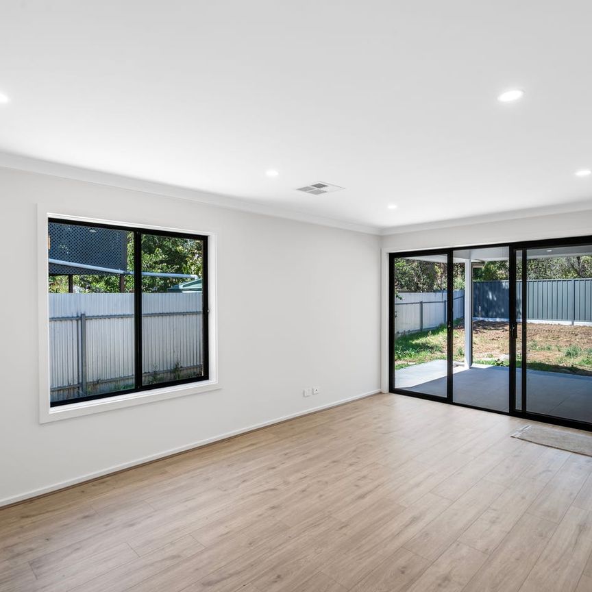 Spacious Home with Outdoor Entertaining in Prime Location - Photo 1