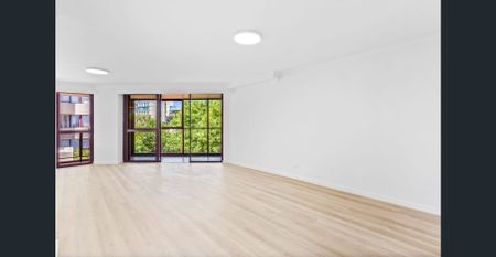 Stylish Renovated Apartment with Wrap-Around Balcony - Photo 3