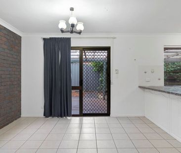 Brick home that effortlessly brings timeless charm - Photo 2