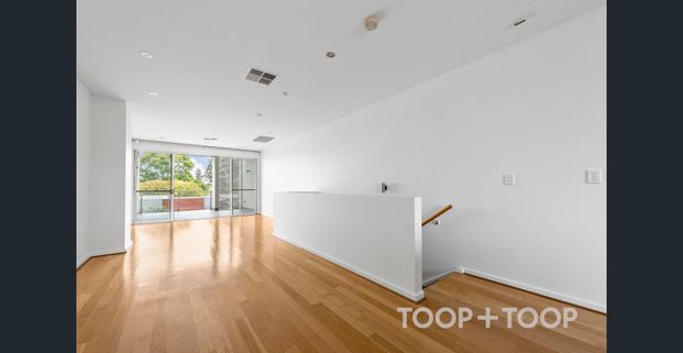 MODERN NORWOOD TOWNHOUSE - Photo 1