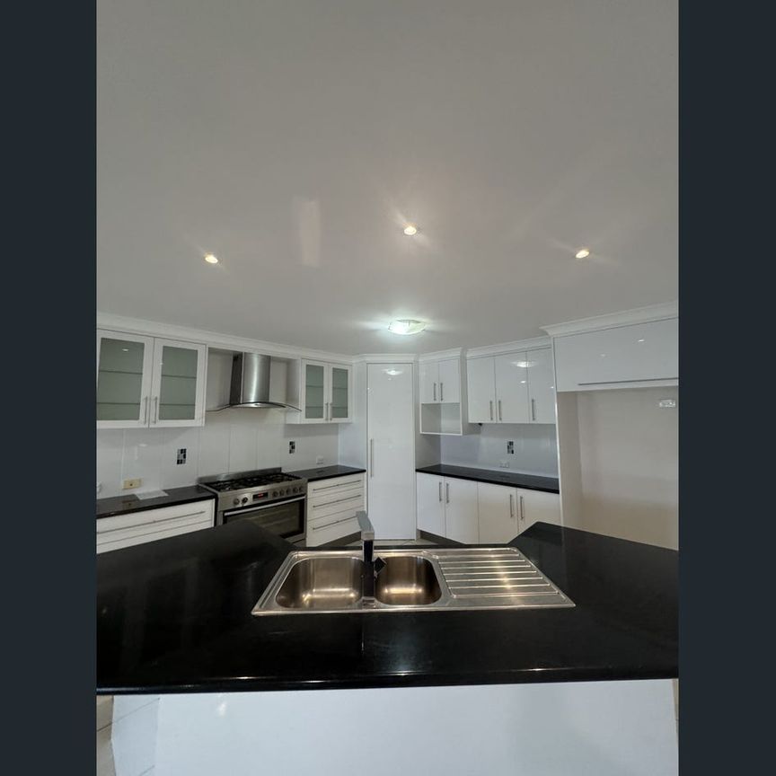 Stunning Modern 4-Bedroom Home -Perfect for Family Living - Photo 1