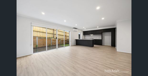 Contemporary Townhouse Living – Walk to Everything - Photo 1