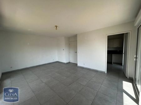 Appartement à louer 4 pièces 74.8m² - Photo 3