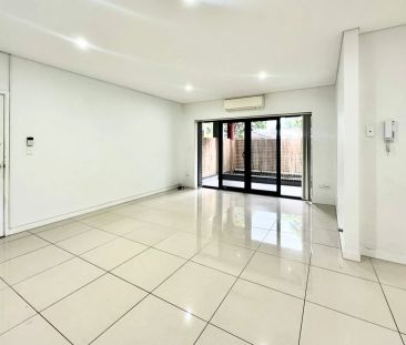 Spacious and Modern Apartment in a Prime Yagoona Location - Photo 1