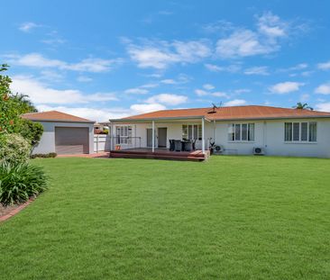 Family-Friendly Gem with Expansive Entertaining Deck & Yard Maintenance Included - Photo 1