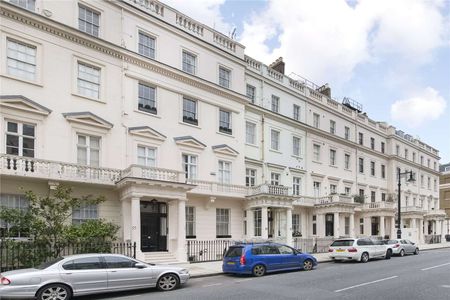 A beautifully refurbished penthouse apartment with direct lift access situated mid terrace along Eaton Place boasting a stunning private roof terrace. - Photo 3