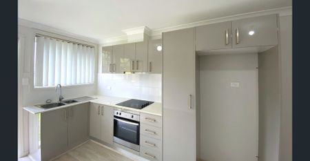 BEAUTIFUL FLAT WITH OFF STREET PARKING! - Photo 2