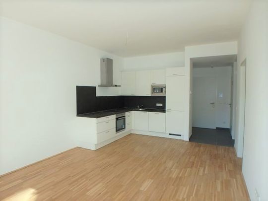 Moderne 2-Zimmer Wohnung mit Lift, großer Loggia und Garagenplatz - Photo 1