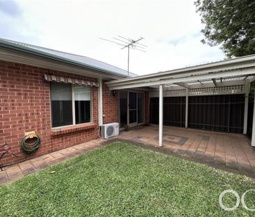 Open the Door To Light-Filled Living in a Peaceful Parkside Setting - Photo 2