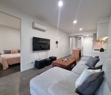 Partly Furnished Immaculate Apartment - Photo 1