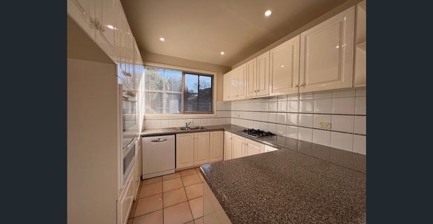 TOWNHOUSE LIVING AT ITS BEST - Photo 1