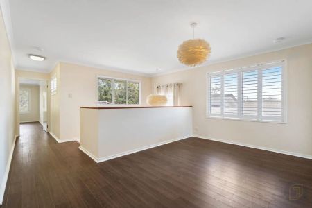 “Spacious 4-Bedroom Family Home + Study + Media. Solar Included!” - Photo 4