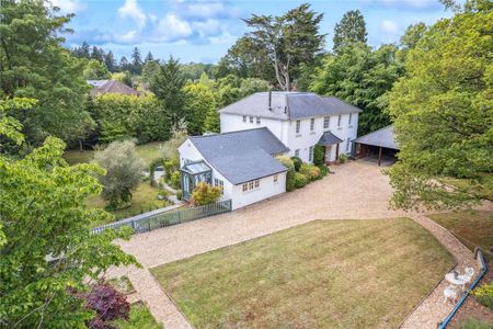 A handsome detached family home providing beautifully presented accommodation and situated on a mature, landscaped plot approaching 0.5 acre located under a mile from the village centre. - Photo 4