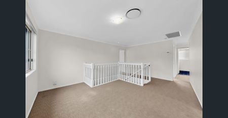 Spacious 5-Bedroom Family Home with Ducted Air and Media Room - Photo 2