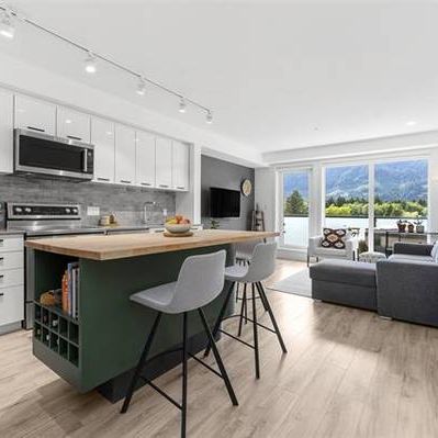 Modern 1-Bedroom + Den Condo with Spectacular Mountain Views - Photo 3