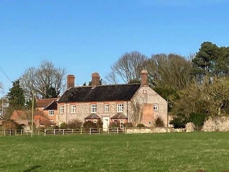 This recently renovated substantial period farmhouse is a desirable family home located in a rural location close to the popular market town of Holt and near to - Photo 2