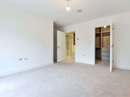Situated within the prestigious Royal Wells development, is this two bedroom two bathroom ground floor apartment with underground parking space and patio terrace. - Photo 3