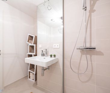 Moderne 1,5-Zi.-Wohnung mit Loggia & Rooftop Wellness - Photo 4