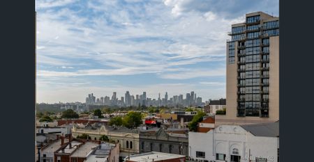 Three-Bedroom Apartment - Photo 2