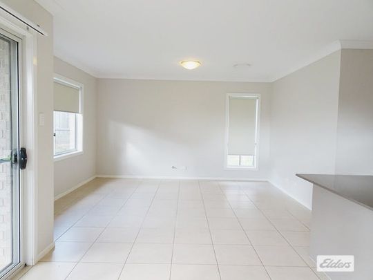 Comfortable 4 Bedroom Family Home - Photo 1