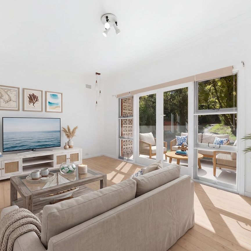 Charming Renovated Home with Light-Filled Living & Leafy Backyard - Photo 1