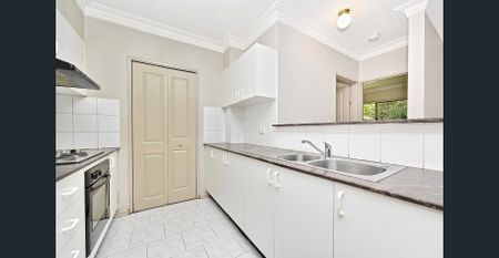 Ground Floor 2 Bedroom Unit with Courtyard! - Photo 4