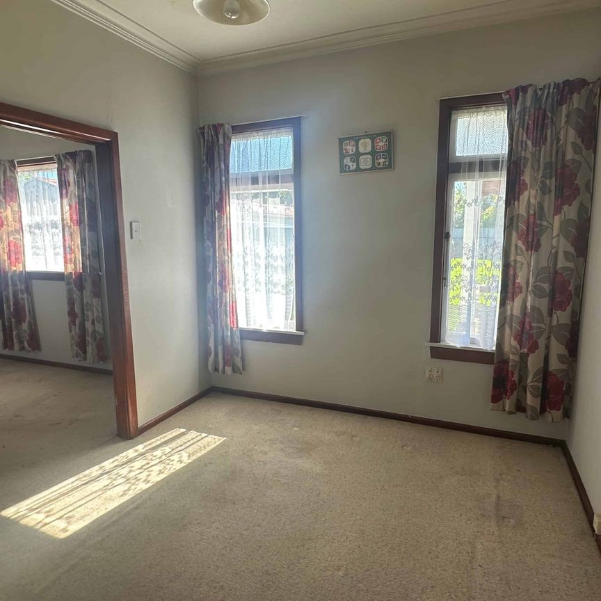 Spacious Four-Bedroom Home with a Large Section - Photo 1