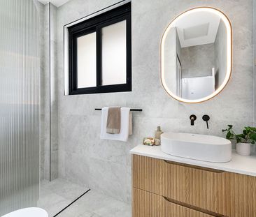 Freshly Renovated Townhouse in Prime Walk-to-Everything Location - Photo 2