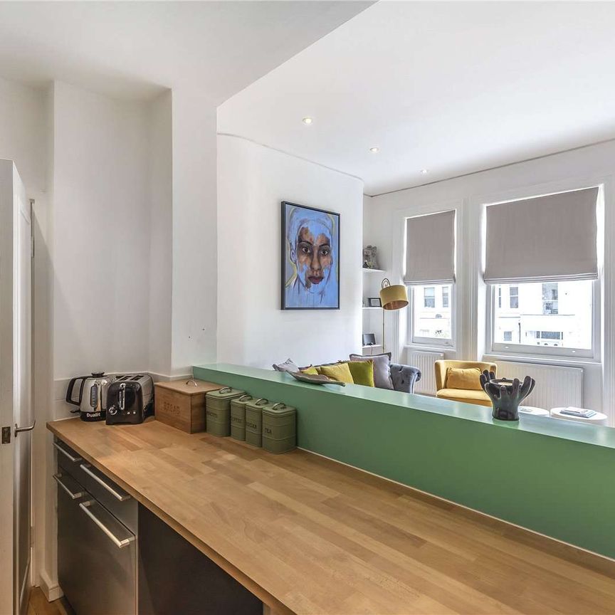 A stunning 1 bedroom apartment finished to an exceptional standard, in this prime Belsize village location. - Photo 1