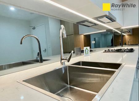 Modern 2-Bed Apartment with Parking in the Heart of Rouse Hill - Photo 2