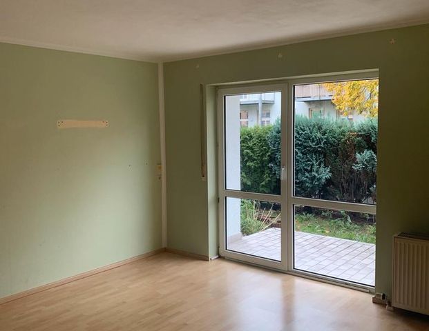 Erdgeschosswohnung mit zwei Terrassen und eigenem Garten - Foto 1