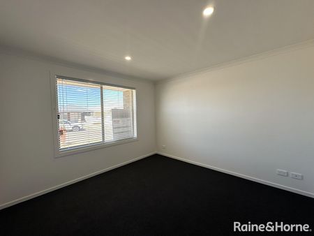 Modern Family Living in the Heart of Munno Para Downs - Photo 3