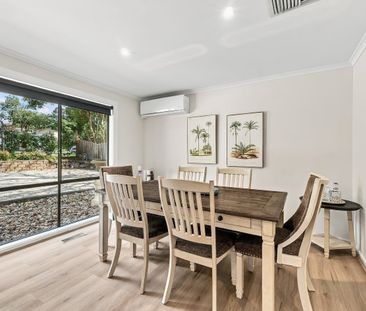 STYLISHLY UPDATED FAMILY LIVING WITH EXCEPTIONAL OUTDOOR APPEAL - Photo 2