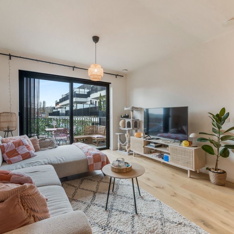 Nieuwbouwappartement met zonnig terras in hartje Steendorp - Photo 1