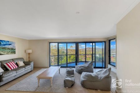 Coastal Luxury with Panoramic Views Over One Mile Beach - Photo 4