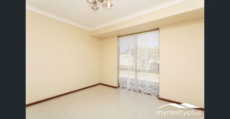 Spacious 3-Bedroom Home with Multiple Living Areas - Photo 4