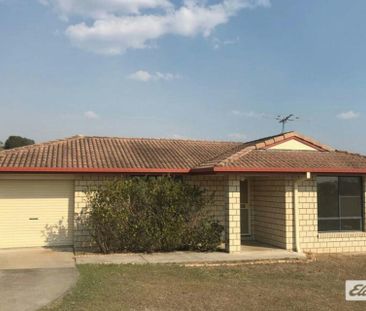 Practical 4-Bedroom Brick Home - Photo 4