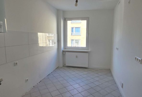 Helle 4-Zimmer-Wohnung mit Balkon in der Südstadt! - Photo 1
