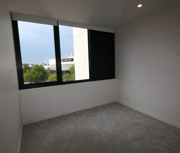 Nearly New Two Bedroom Apartment with Study - Photo 2
