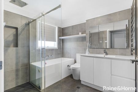 Spacious 5-Bedroom Home in a Quiet Court Location - Photo 3